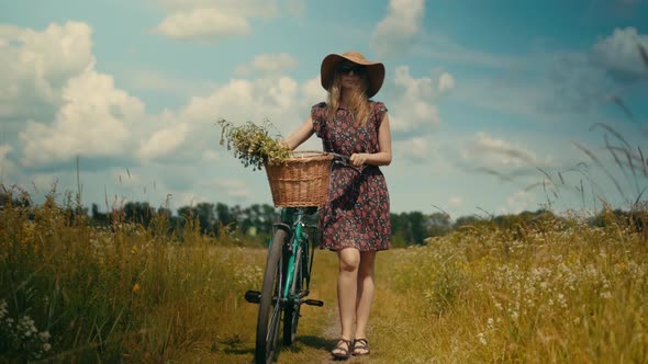 Beautiful Woman Walking With Bicycle.Lady Moving On Bicycle.Girl With Retro Bicycle.