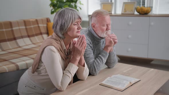 Religion Believers Elderly Married Couple Kneeling with Folded Hands in Love and Hope for God While alt