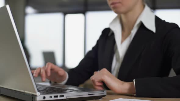 Businesswoman Finishes Work on Laptop, Career and Employment Concept, Closeup