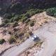 4K .Aerial landscape. Fly over mountain road with car top view - VideoHive Item for Sale