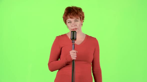 Singer Performs Her Song of Authorship. Green Screen