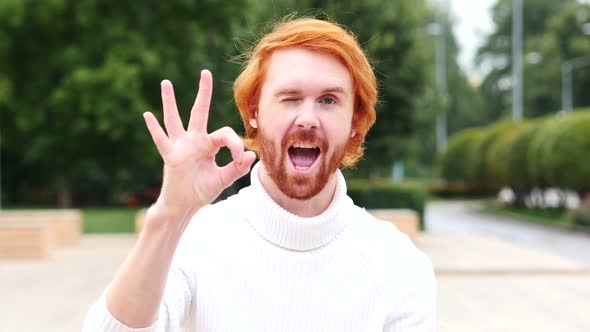 Okay Sign, gesture by Excited Man with Red Hairs, Outdoor