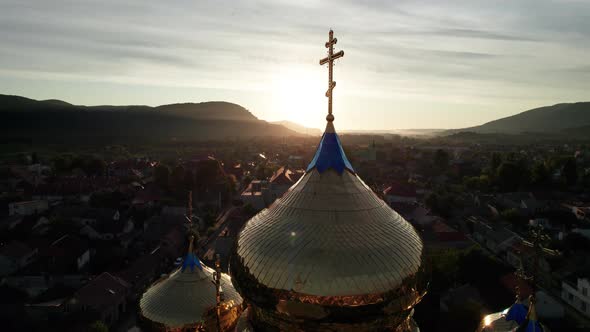 Golden Church Cross on Against Sunset Aerial View Majestic Temple in Ukraine
