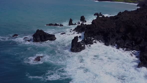 Flying Over The Rugged Coastline Of Hawaii