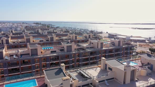 Aerial View of the Urban Area of Portugal in the South of Houses with Modern Infrastructure Swimming