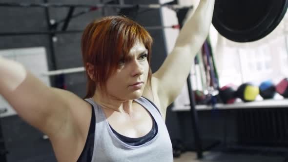 Sportswoman Doing Overhead Squat