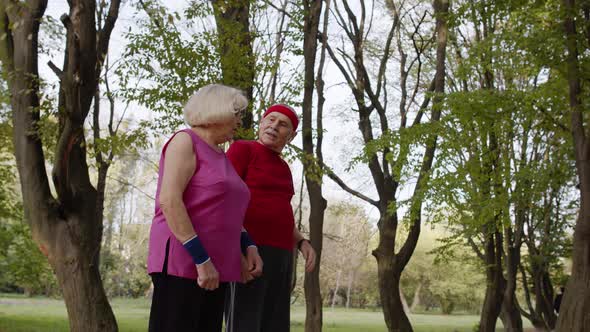 Sporty Mature Couple Family Jogging Together. Senior Husband and Wife Doing Cardio Workout Exercises