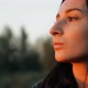 Young Charming Woman Opens Her Eyes and Looks at the Sunset. - VideoHive Item for Sale