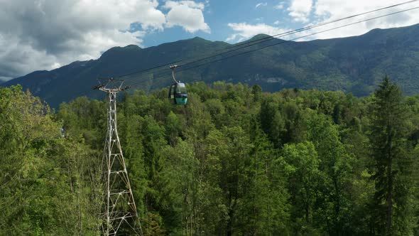 Drone Flight Over Forest With Cable Cars