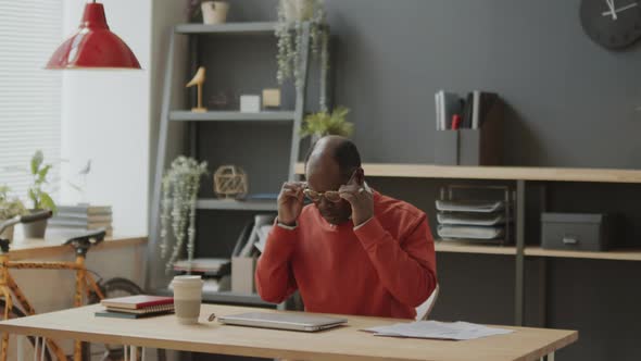 Black Businessman Leaving Office in End of Workday