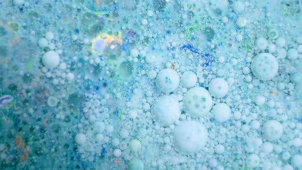 Slow Motion of Bright Colored Bubbles alt