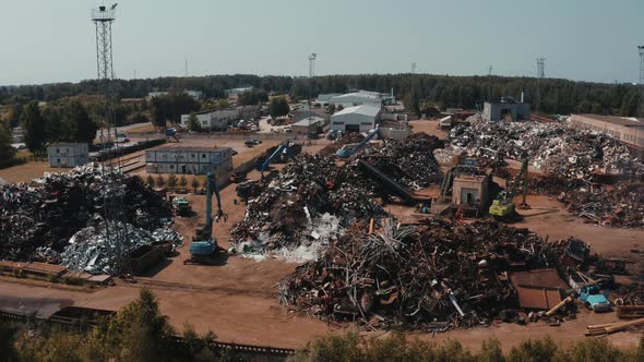 Old Wrecked Cars in Junkyard Waiting to Be Shredded in a Recycling Park