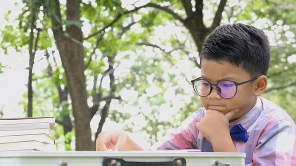 Boy learning and thinking