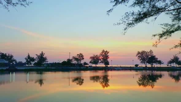 Aerial View Reflaction Of Sunset At The Pond.