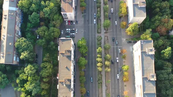 Aerial drone video of downtown apartment buildings and cars on the highway in Pecherskyi district of