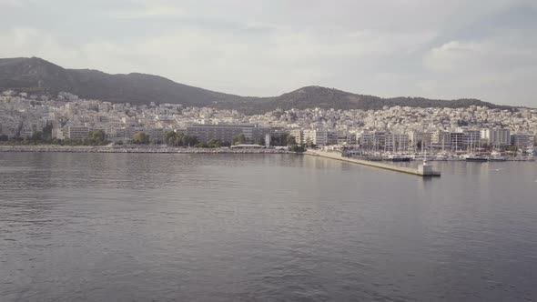 Seagulls Flying Above Calm Sea Surface in Kavala, Greece