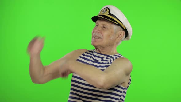 Elderly Sailor Man Funny Dances. Old Sailorman on Chroma Key Background