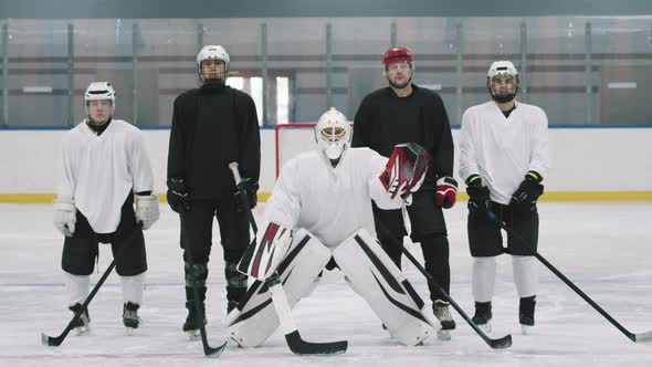 Full Portrait Of Hockey Team On Ice Arena