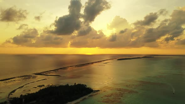 Aerial top view landscape of relaxing bay beach voyage by aqua blue ocean with white sandy backgroun