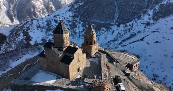 Aerial view of Gergeti Trinity Church, Tsminda Sameba in Kazbegi. Georgia 2022