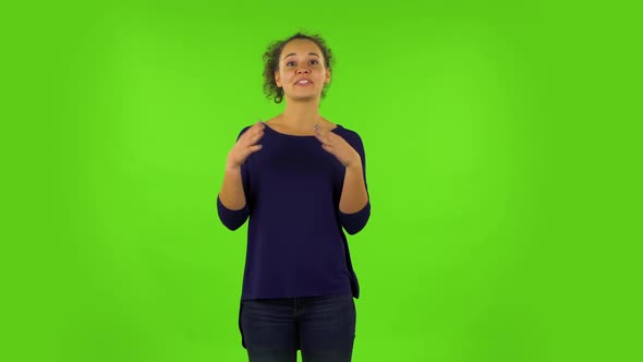 Curly Woman Talking About Something Then Making a Hush Gesture, Secret. Green Screen