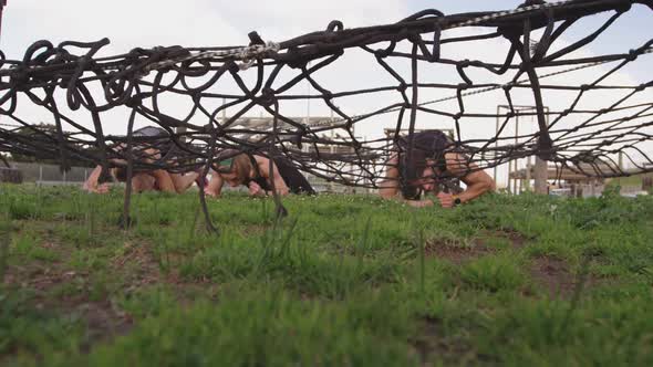 Young adults training at an outdoor gym bootcamp