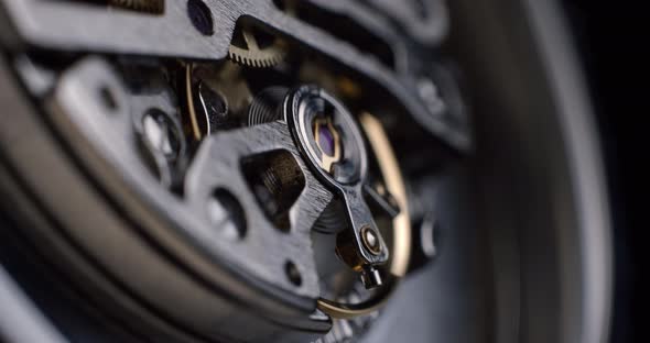 Watch tourbillon rotating macro slowmotion