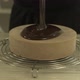 Professional chef tossing chocolate onto a cake - VideoHive Item for Sale