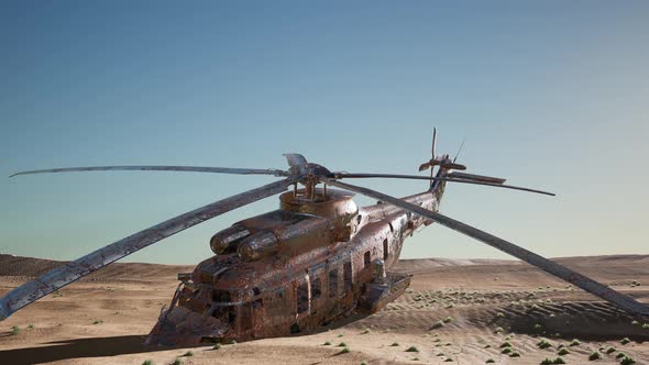 Old Rusted Military Helicopter in the Desert at Sunset