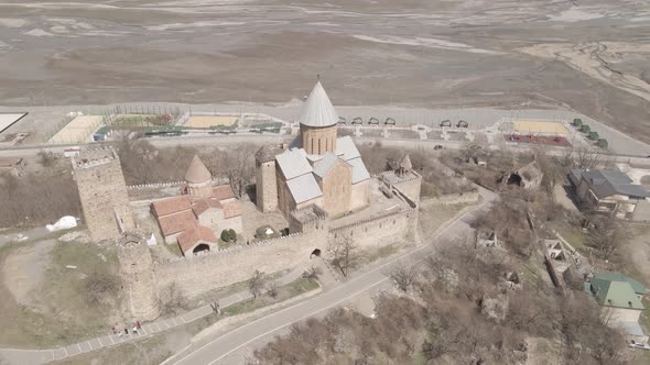 Aerial view of old Ananuri Fortress with two churches and picturesque view on river. Georgia 2021