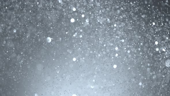 Super Slow Motion Shot of SIlver Glitter Background at 1000Fps