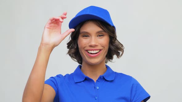 Portrait of Happy Delivery Woman in Blue Uniform