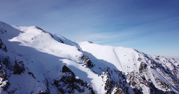 Huge Rocks Covered with Snow