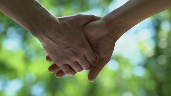 Man Letting Partners Hand Go, Homosexual Couple Break Up, Misunderstanding