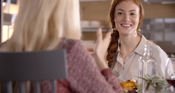 Caucasian Woman Having Lunch with Friends