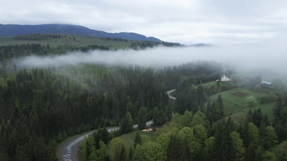 Ukraine, Carpathians: Fog in the Mountains. Aerial.