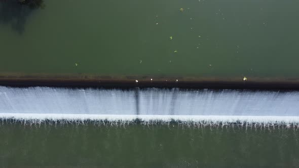 River Landscape With Dam And Waterfall. Aerial view.