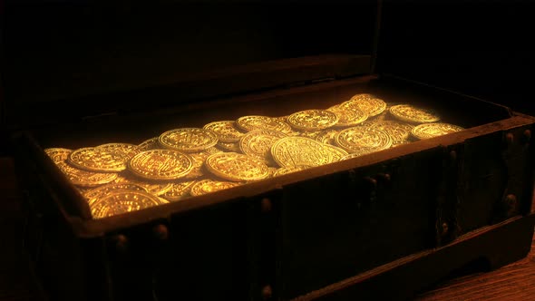 Glowing Gold Coins Revealed In Chest In Firelight
