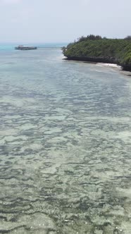 Vertical Video of Low Tide in the Ocean Near the Coast of Zanzibar Tanzania