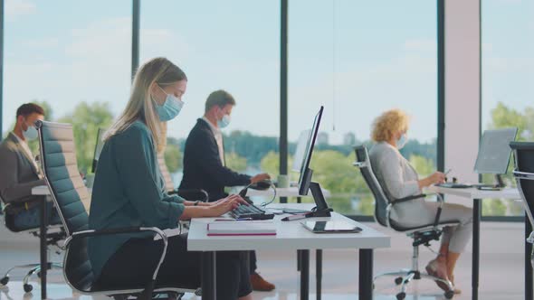 Various people using computer for work