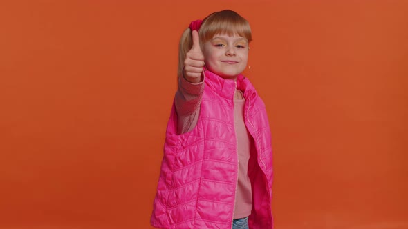 Toddler Girl Raises Thumbs Up Agrees or Gives Positive Reply Recommends Advertisement Likes Good