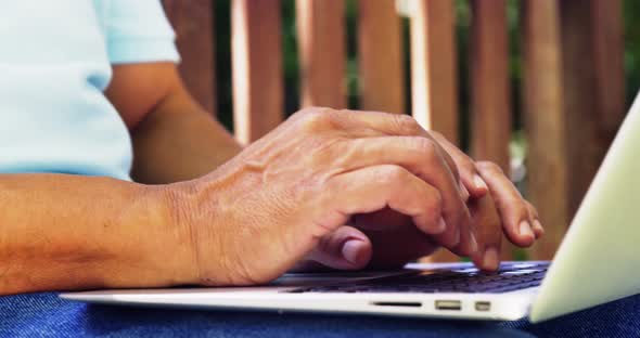 Senior man using laptop