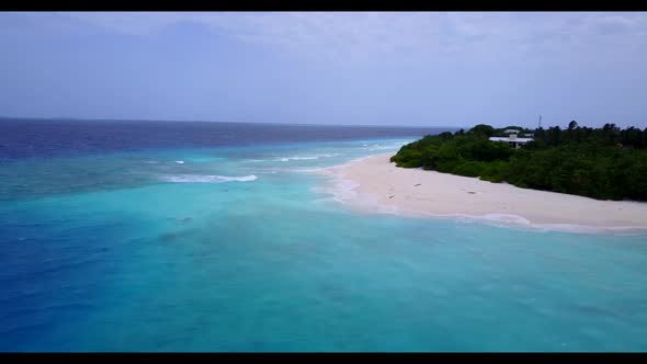 Aerial above sky of luxury shore beach trip by blue water and clean sandy background of a dayout nea