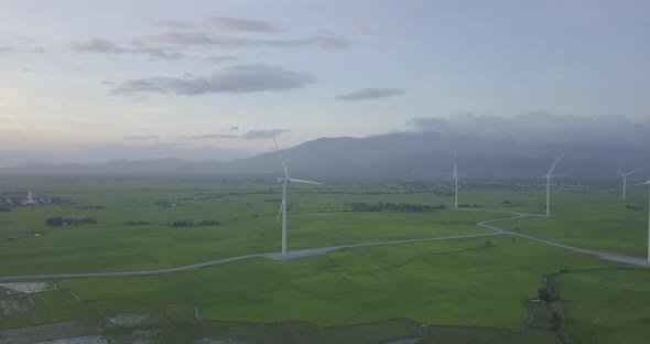  Wind turbine or windmill in a greenfield - Energy Production with clean and Renewable Energy