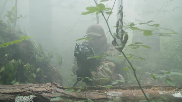 Gunner and Sniper with Weapon Sitting in Wait in Concealed Position