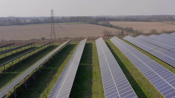 A Solar Farm and Traditional Farming Side By Side