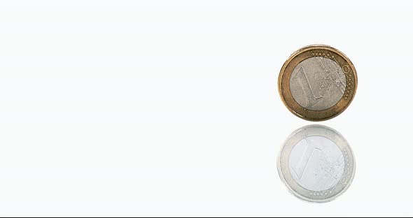 Coin of 1 Euro Rolling against White Background, Slow motion 4K