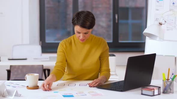 Creative Woman Working on User Interface at Office 8