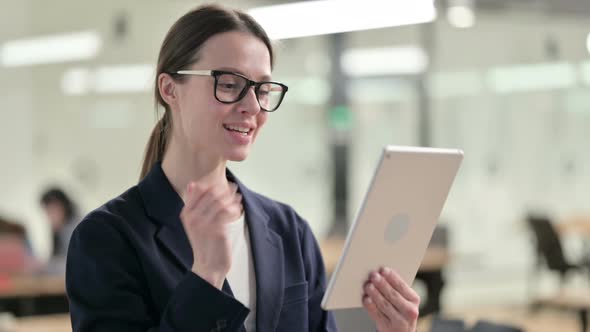 Portrait of Young Businesswoman Attending Video Call on Tablet