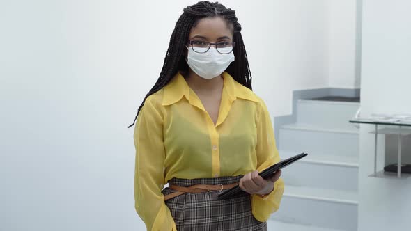 Portrait of a businesswoman looking at the camera in the office